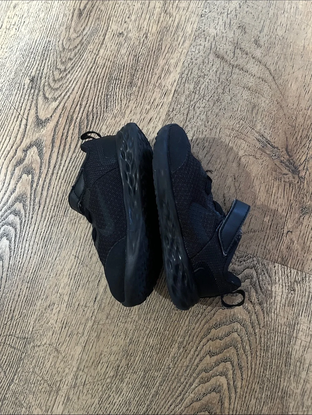 Black Nike kids shoes